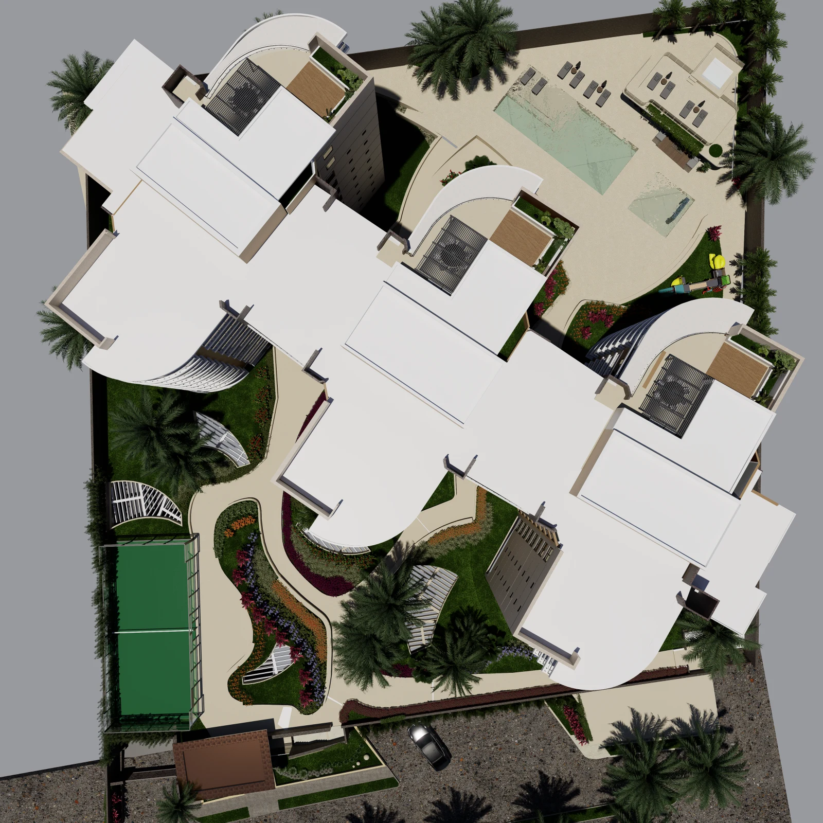 Vista aérea del conjunto Blue Coast Residence: las tres torres, la piscina y la cancha